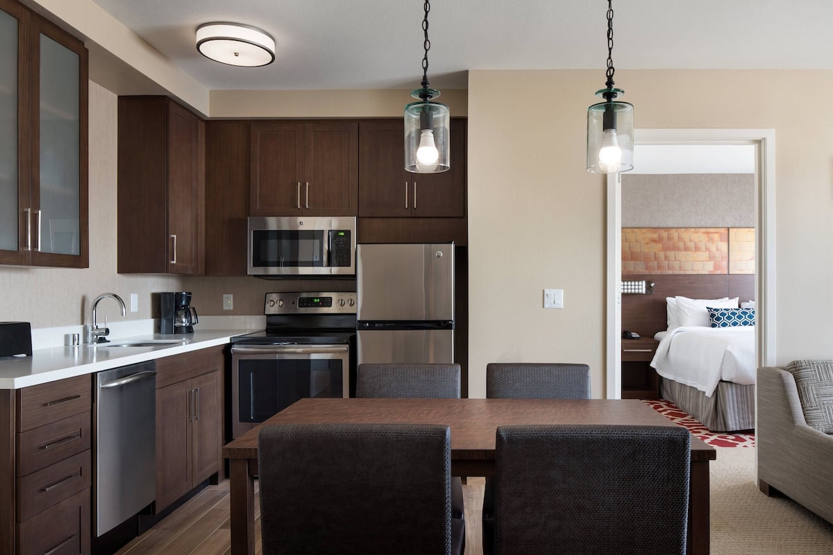 full-sized fridge, microwave, stovetop, dishwasher