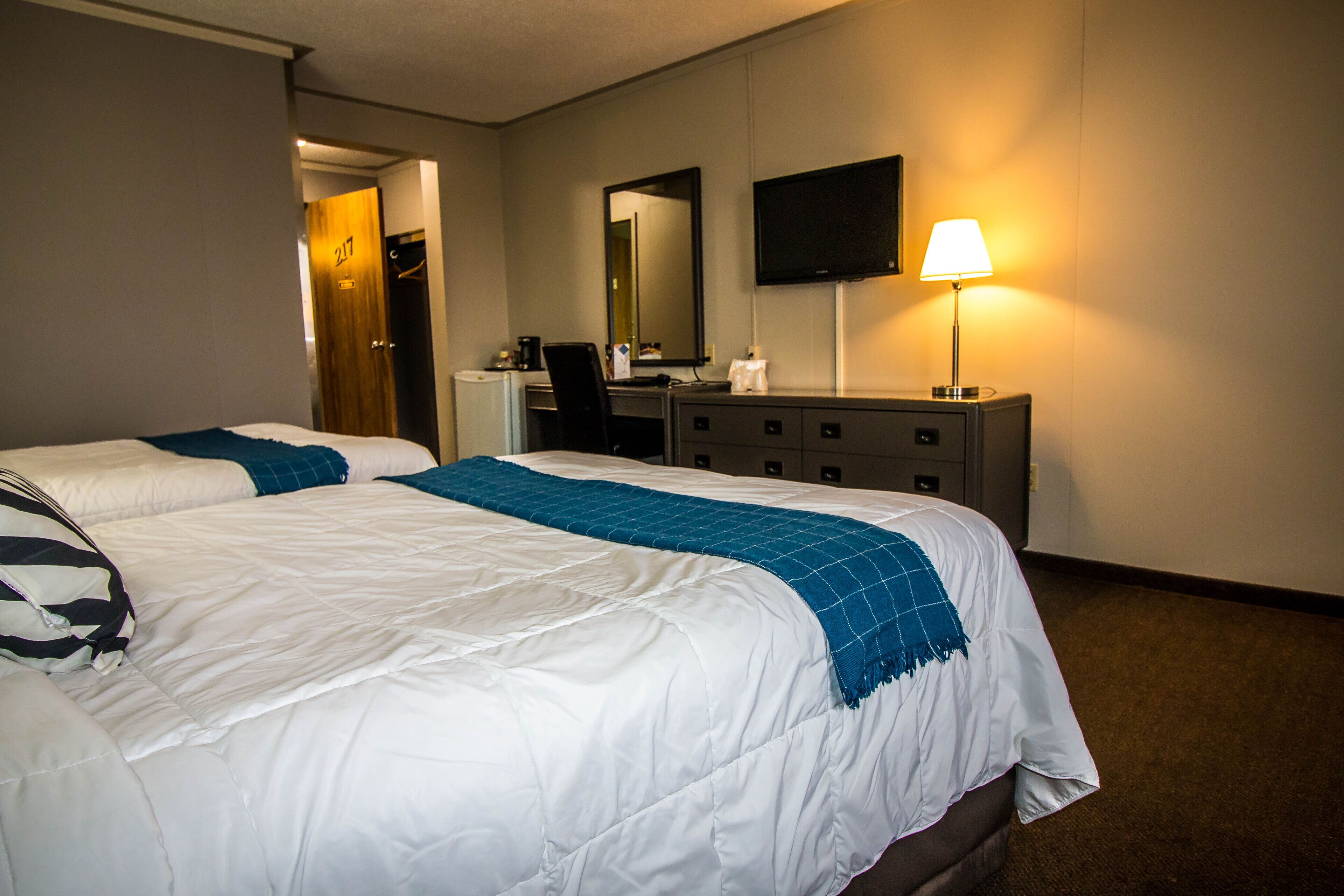 Room, 2 Double Beds | Desk, laptop workspace, blackout curtains, iron/ironing board