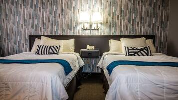 Desk, laptop workspace, blackout drapes, iron/ironing board