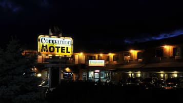 Companion Hotel's exterior features a prominent signboard and reception area, with multi-storied architecture and balconies.