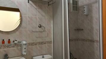 Shower, free toiletries, hair dryer, slippers