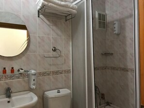 Shower, free toiletries, hair dryer, slippers