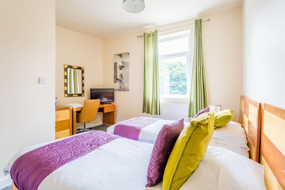 Desk, laptop workspace, free cots/infant beds, free WiFi