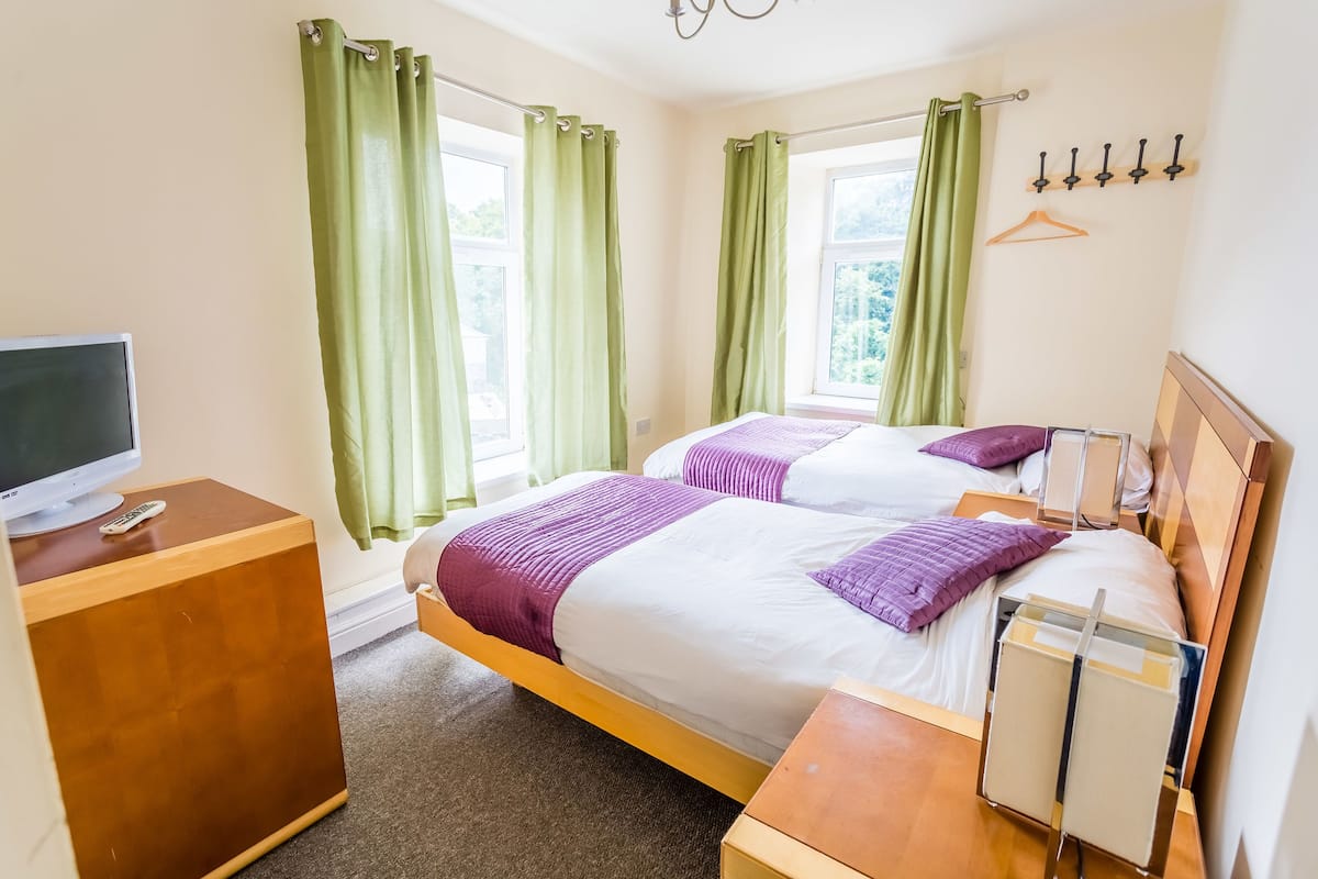 Desk, laptop workspace, free cots/infant beds, free WiFi