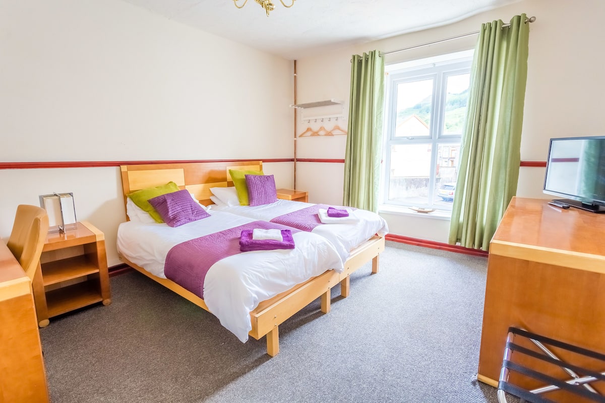 Desk, laptop workspace, free cots/infant beds, free WiFi