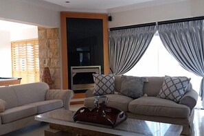 Flat-screen TV, fireplace