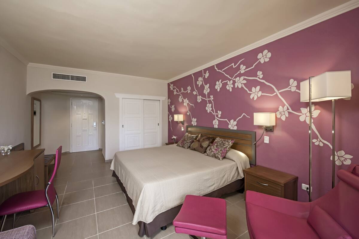 Down comforters, free minibar, in-room safe, desk