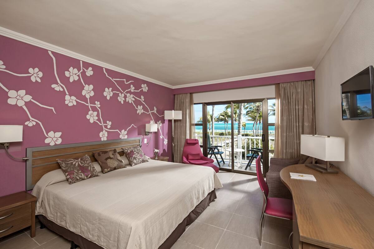 Down comforters, free minibar, in-room safe, desk