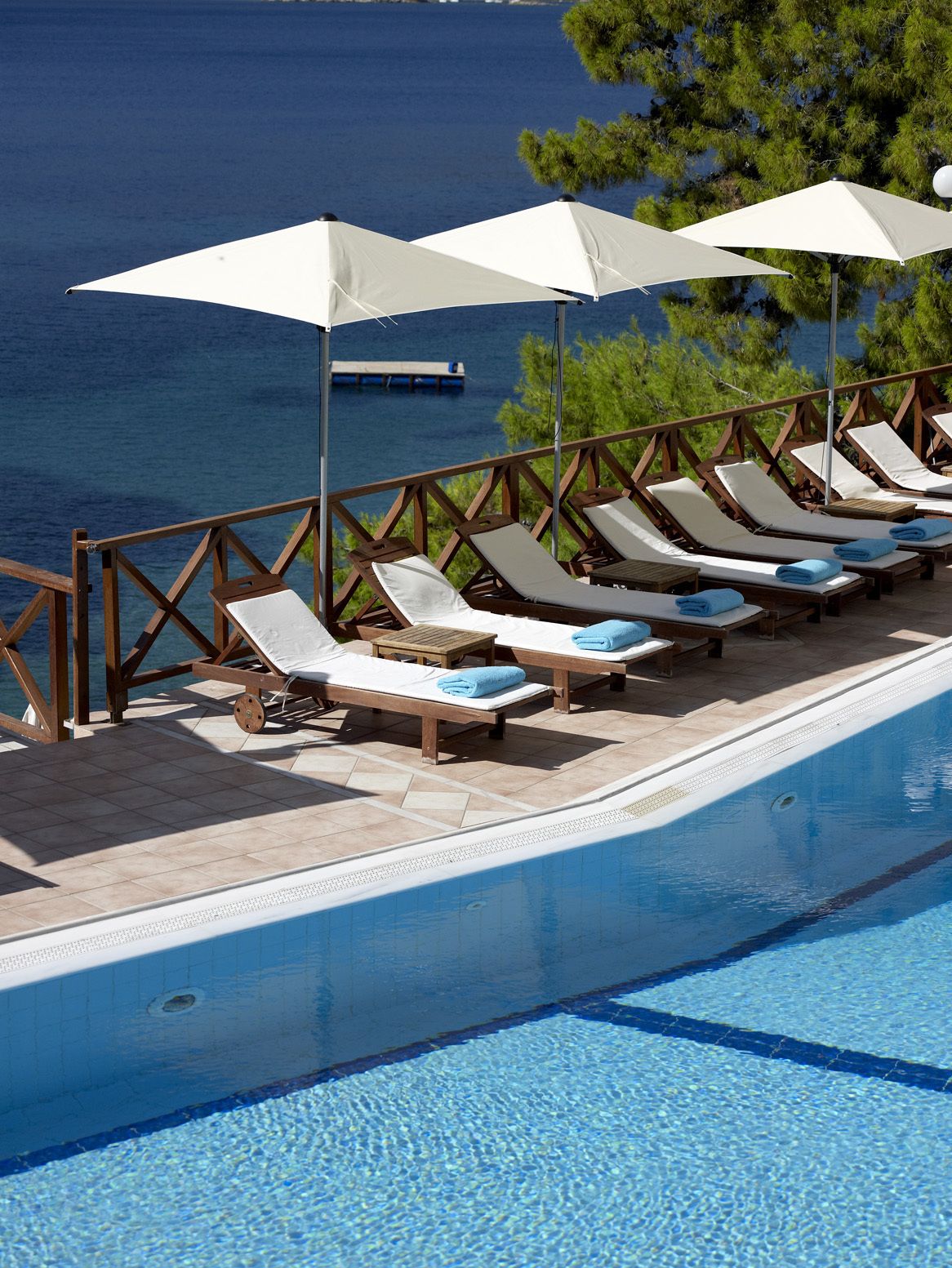 2 outdoor pools, pool umbrellas, pool loungers