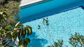2 outdoor pools, pool umbrellas, pool loungers