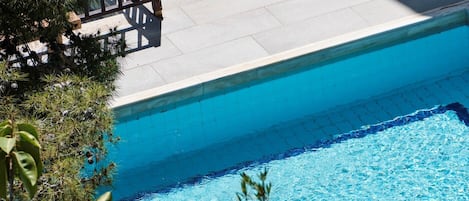 2 outdoor pools, pool umbrellas, pool loungers