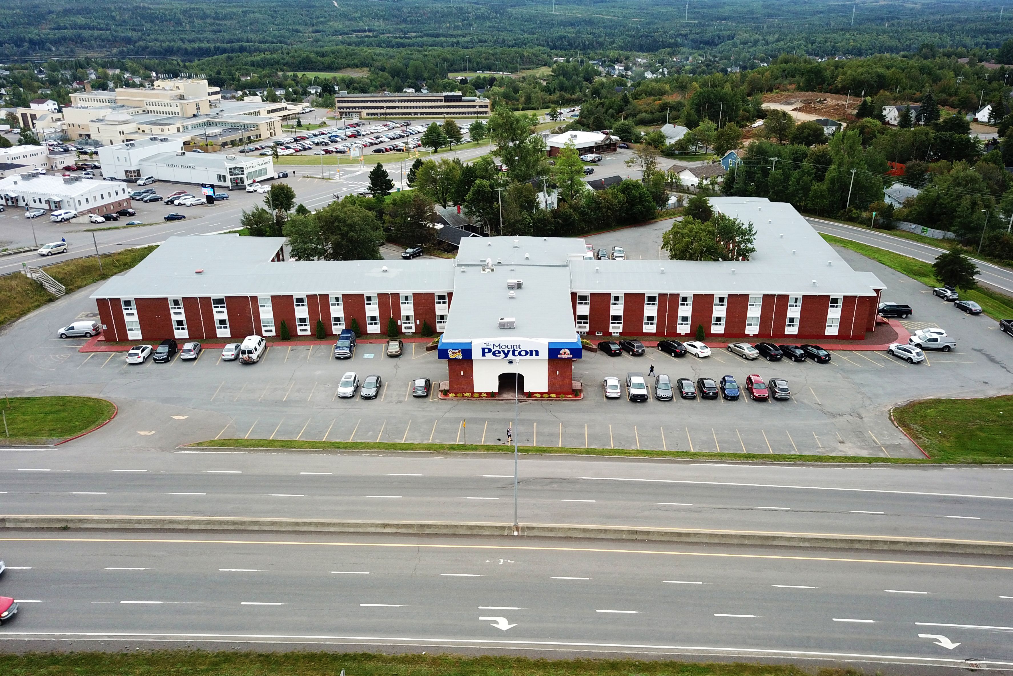 A large, multi-story parking structure with a prominent entrance labeled "Mount Peyton."