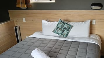 Loft familiar, baño en la habitación | Ropa de cama