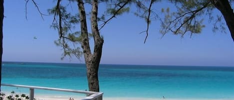 On the beach, sun loungers, beach towels