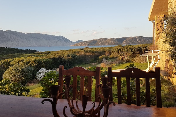 A stunning view from the porch, breakfast on this table is a true treat!
