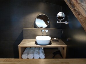 Shower, hair dryer, slippers, towels