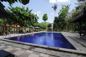 Outdoor pool, open 9:00 AM to 8:00 PM, free pool cabanas, pool umbrellas