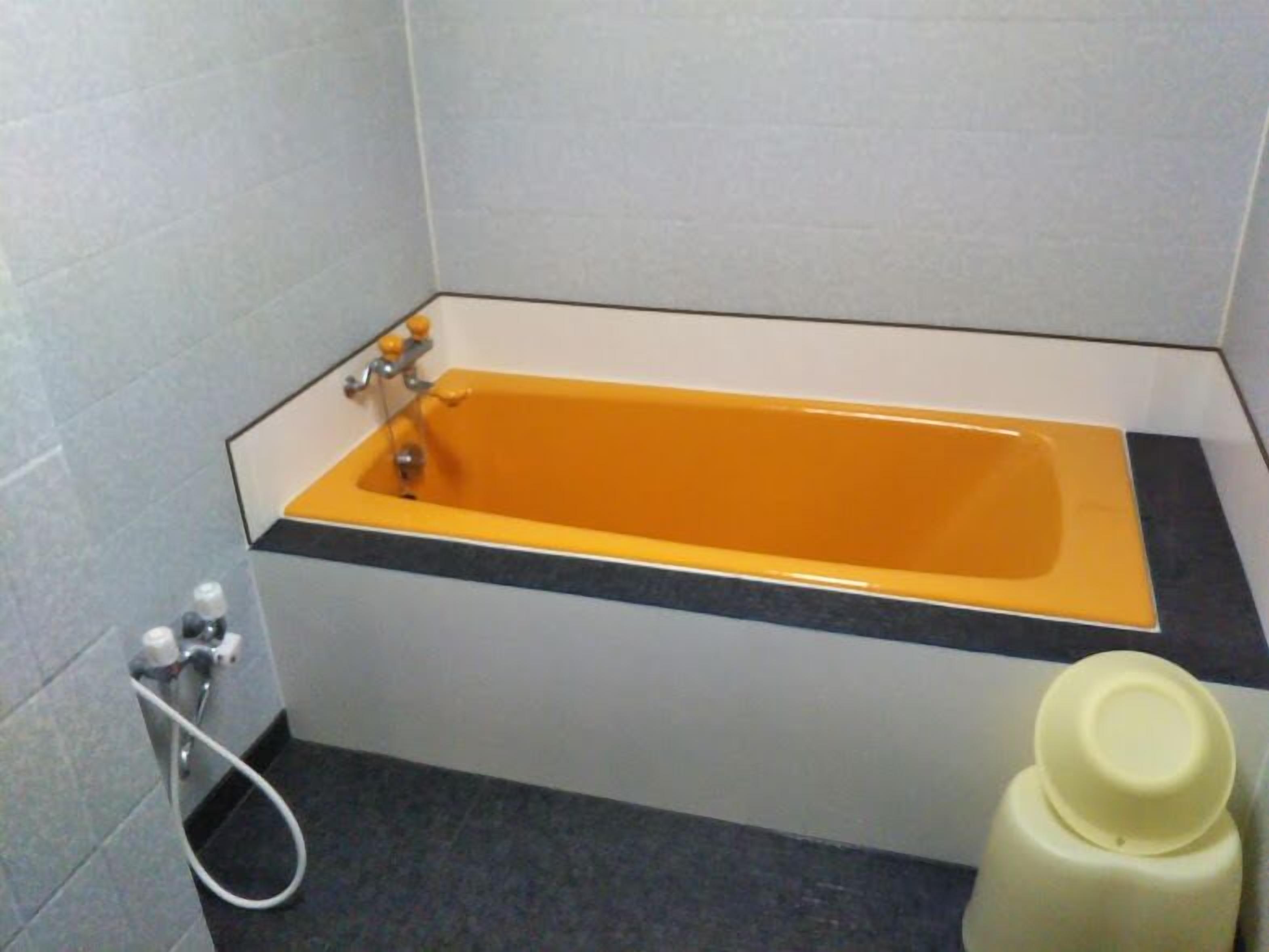 economy double room | bathroom | separate bathtub and shower, free toiletries, hair dryer, slippers