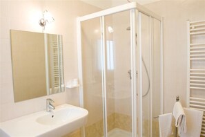 Shower, free toiletries, hair dryer, towels