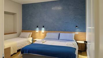 Roupas de cama premium, escrivaninha, quartos à prova de som