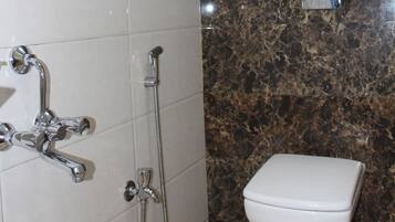 Shower, free toiletries, hair dryer, towels