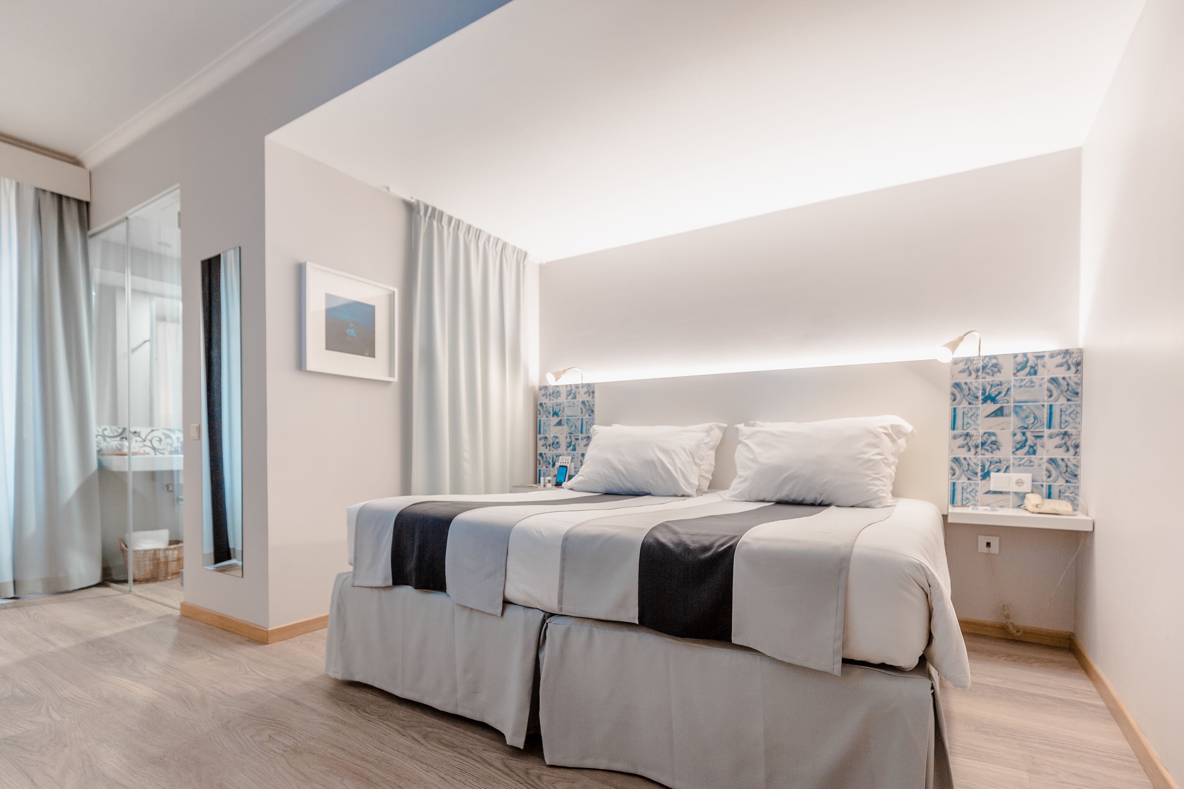 deluxe twin room | down duvets, in-room safe, blackout curtains, soundproofing