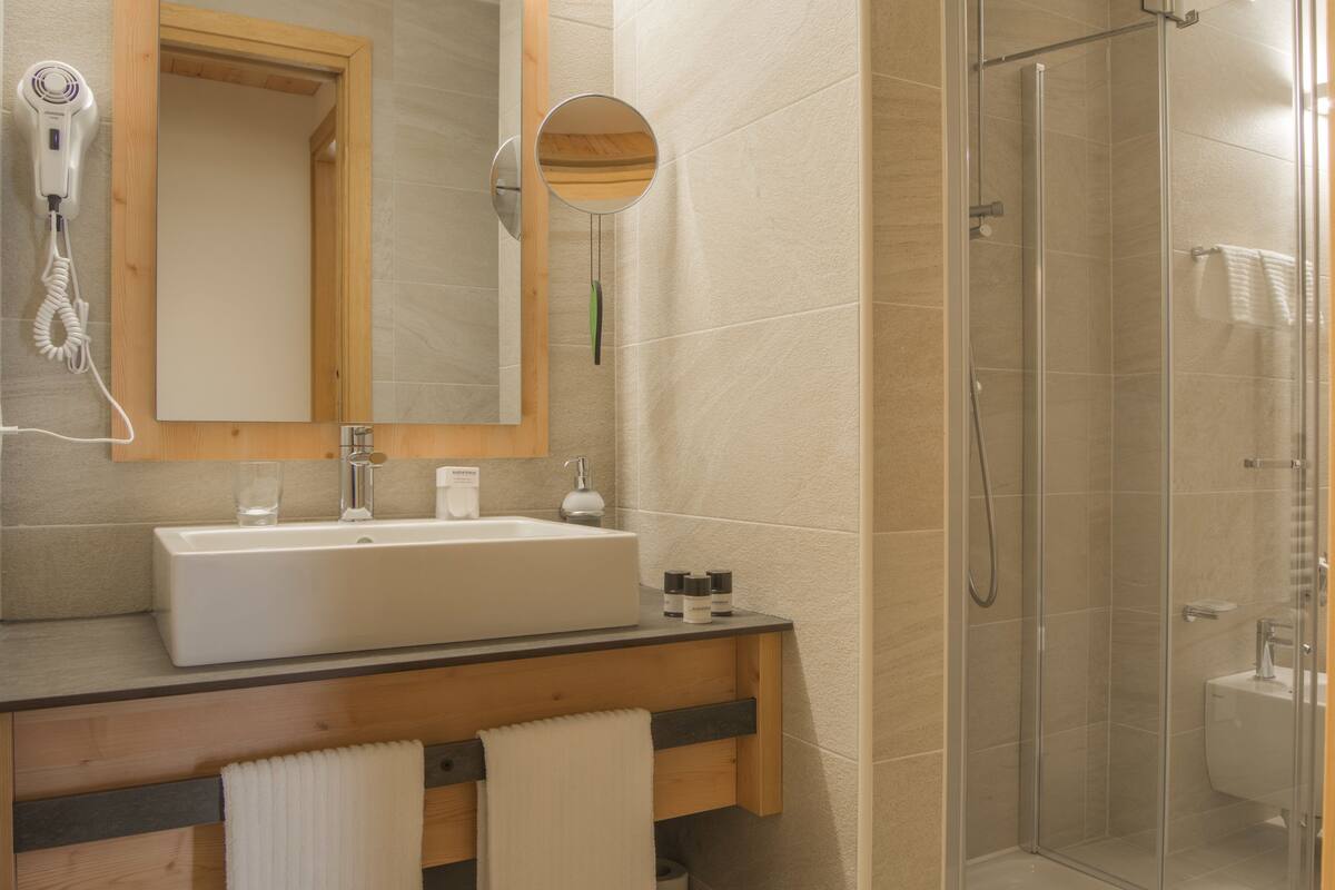 shower, free toiletries, hair dryer, bathrobes