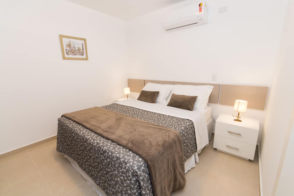Family Room | Minibar, in-room safe, desk, iron/ironing board