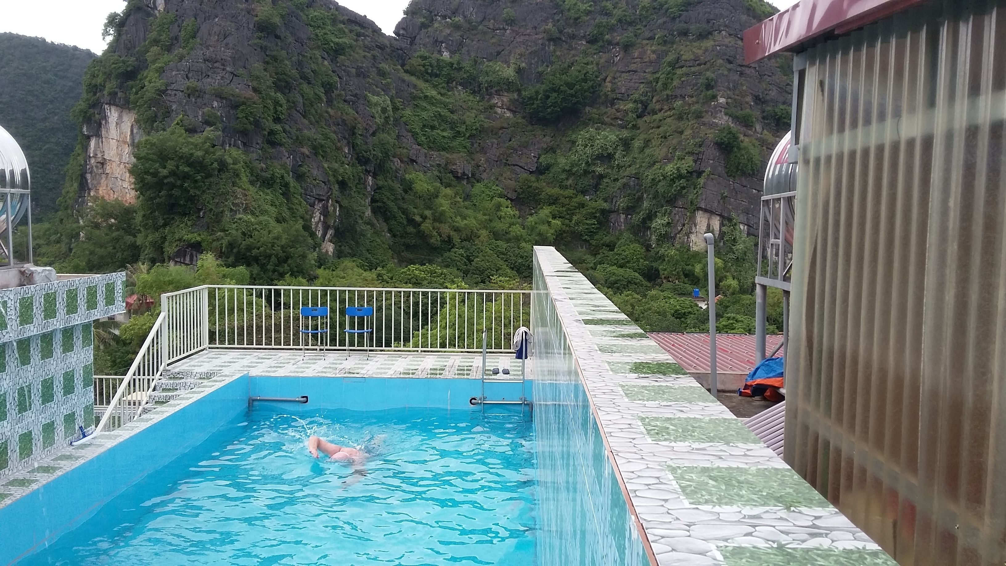 outdoor pool, pool loungers