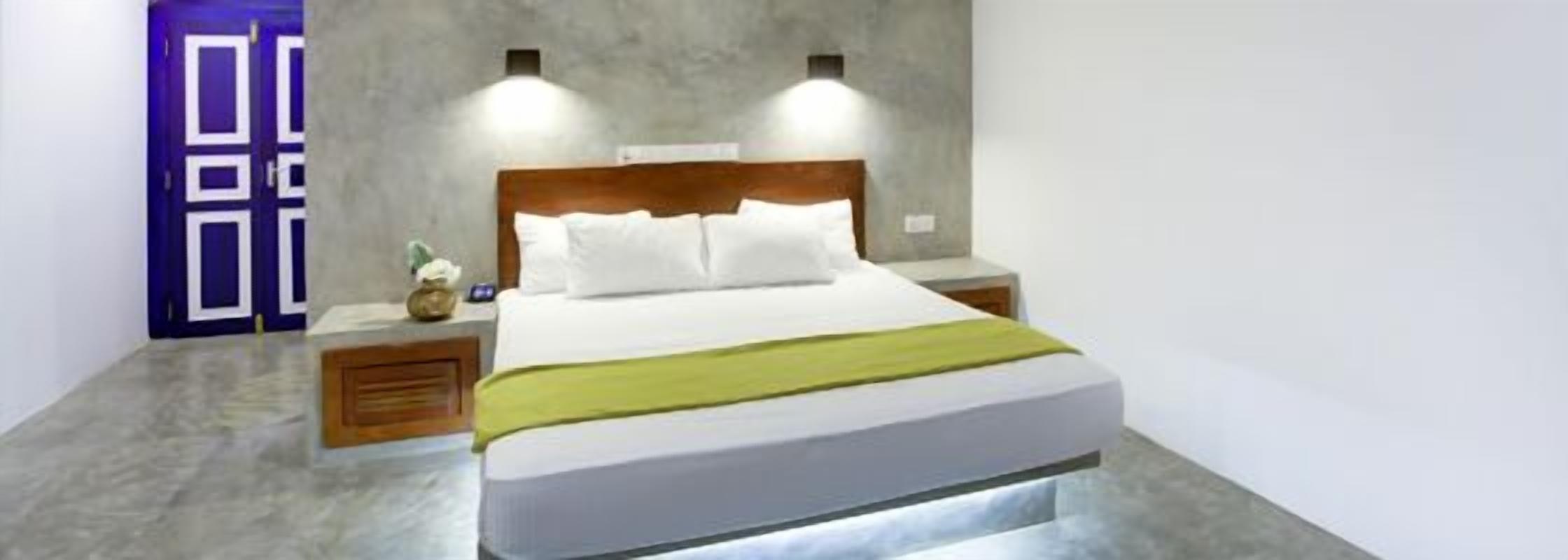 deluxe double room, ocean view | premium bedding, minibar, in-room safe, desk