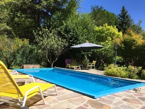 Seasonal outdoor pool, pool umbrellas, pool loungers