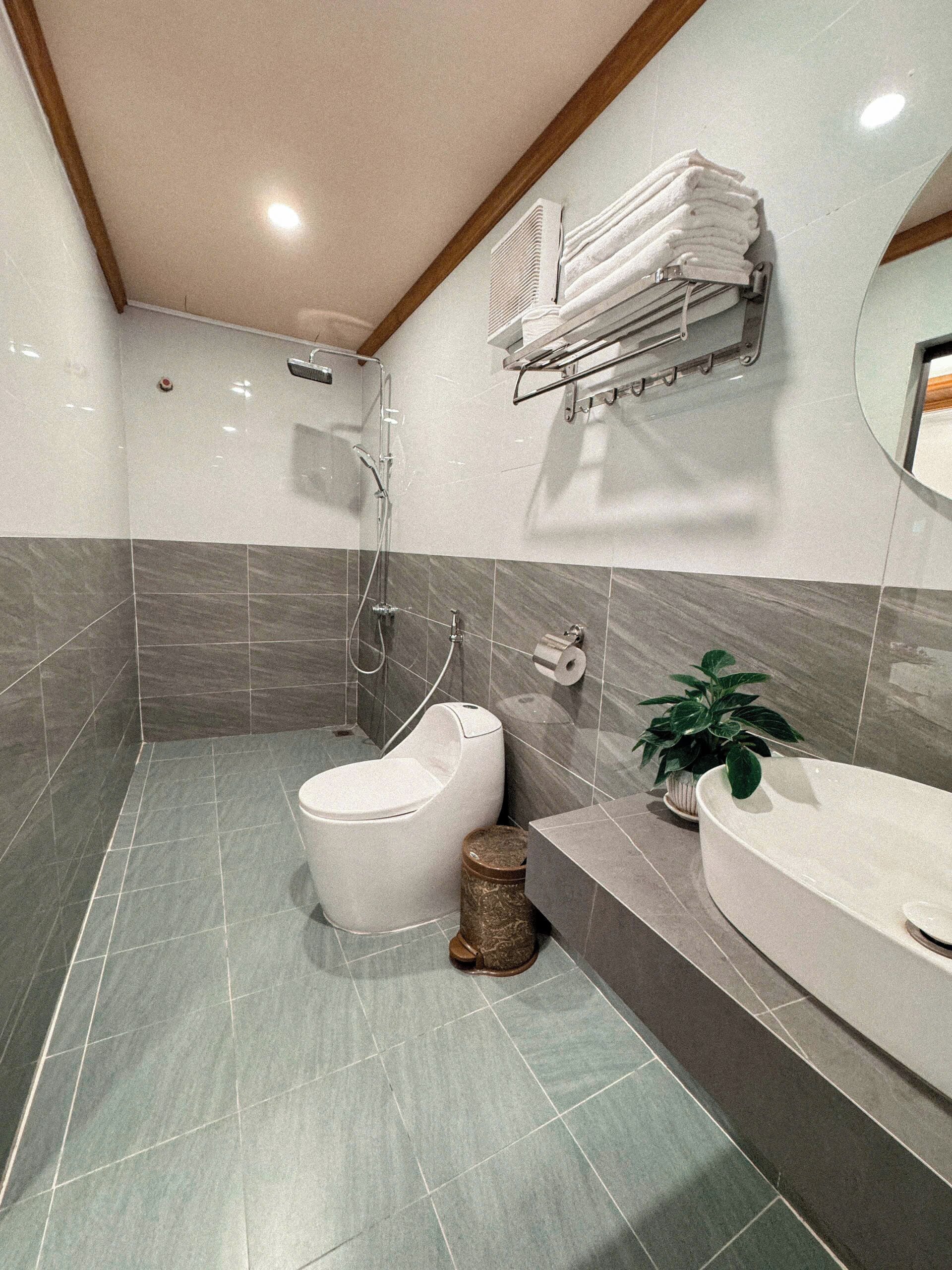Shower, free toiletries, slippers, towels
