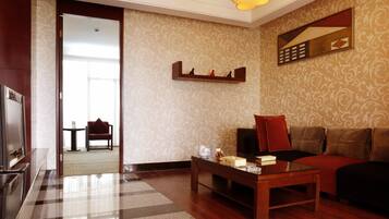 Suite With Garden View | Living area | LCD TV