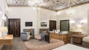 Deluxe Room | Living area | 45-inch flat-screen TV with satellite channels, TV - Nobildonne Relais (Rome)