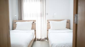 Chambre Familiale | Coffres-forts dans les chambres, chambres insonorisées, Wi-Fi gratuit