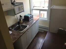 Suite, 2 Queen Beds, Kitchenette | Private kitchenette | Fridge, microwave, coffee/tea maker