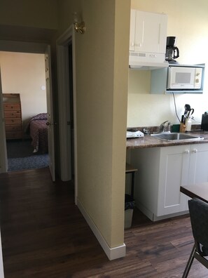 Suite, 2 Queen Beds, Kitchenette | Private kitchenette | Fridge, microwave, coffee/tea maker