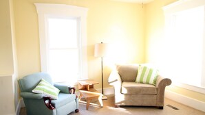 A room with two armchairs, a floor lamp, and a small wooden table. - Great Ski or Summer Rental - 5 miles to Okemo/Ludlow, 25 Gorgeous Acres (Ludlow)