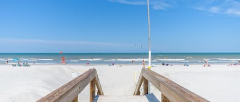 On the beach, sun-loungers, beach towels