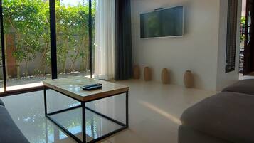 Familie villa | Woonruimte | Een ledtelevisie