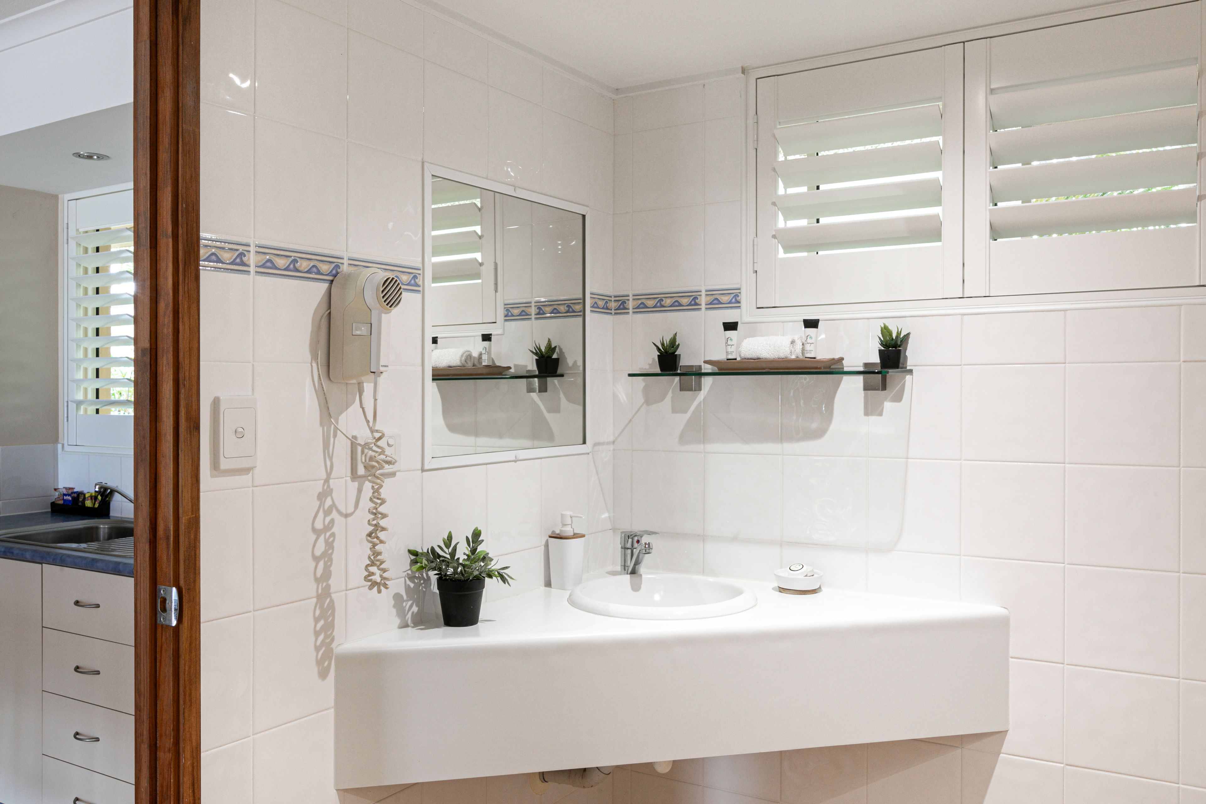 Sunlit Waters Studio Apartments — image 12