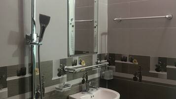 Shower, free toiletries, hair dryer, slippers