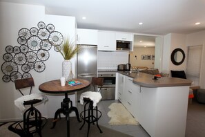 Apartment, 2 Bedrooms | Private kitchen | Full-size fridge, microwave, oven, stovetop
