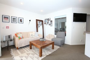 Apartment, 2 Bedrooms | Living room | Flat-screen TV