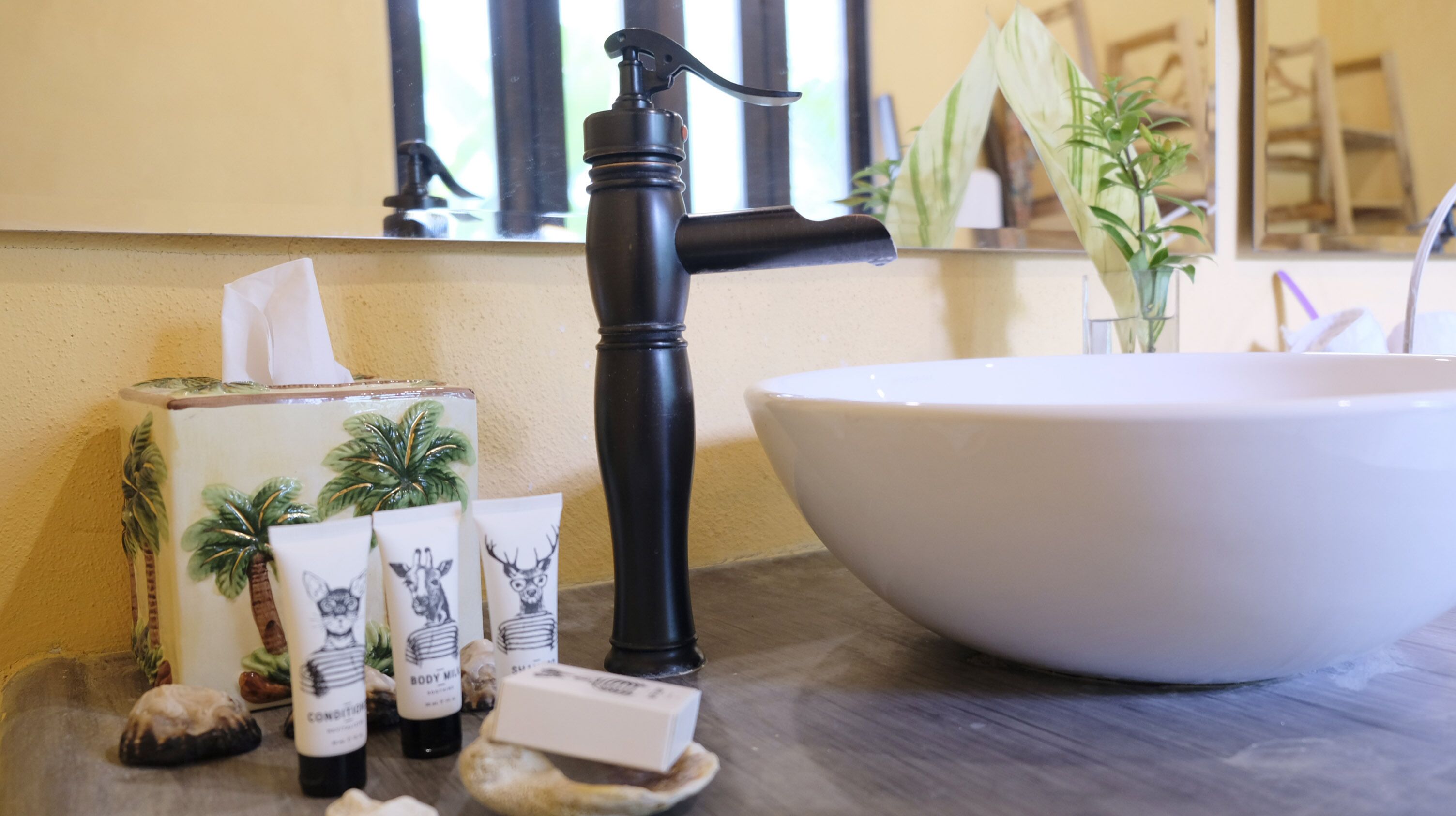 deluxe studio suite, multiple beds, partial ocean view | premium bedding, minibar, in-room safe, individually decorated