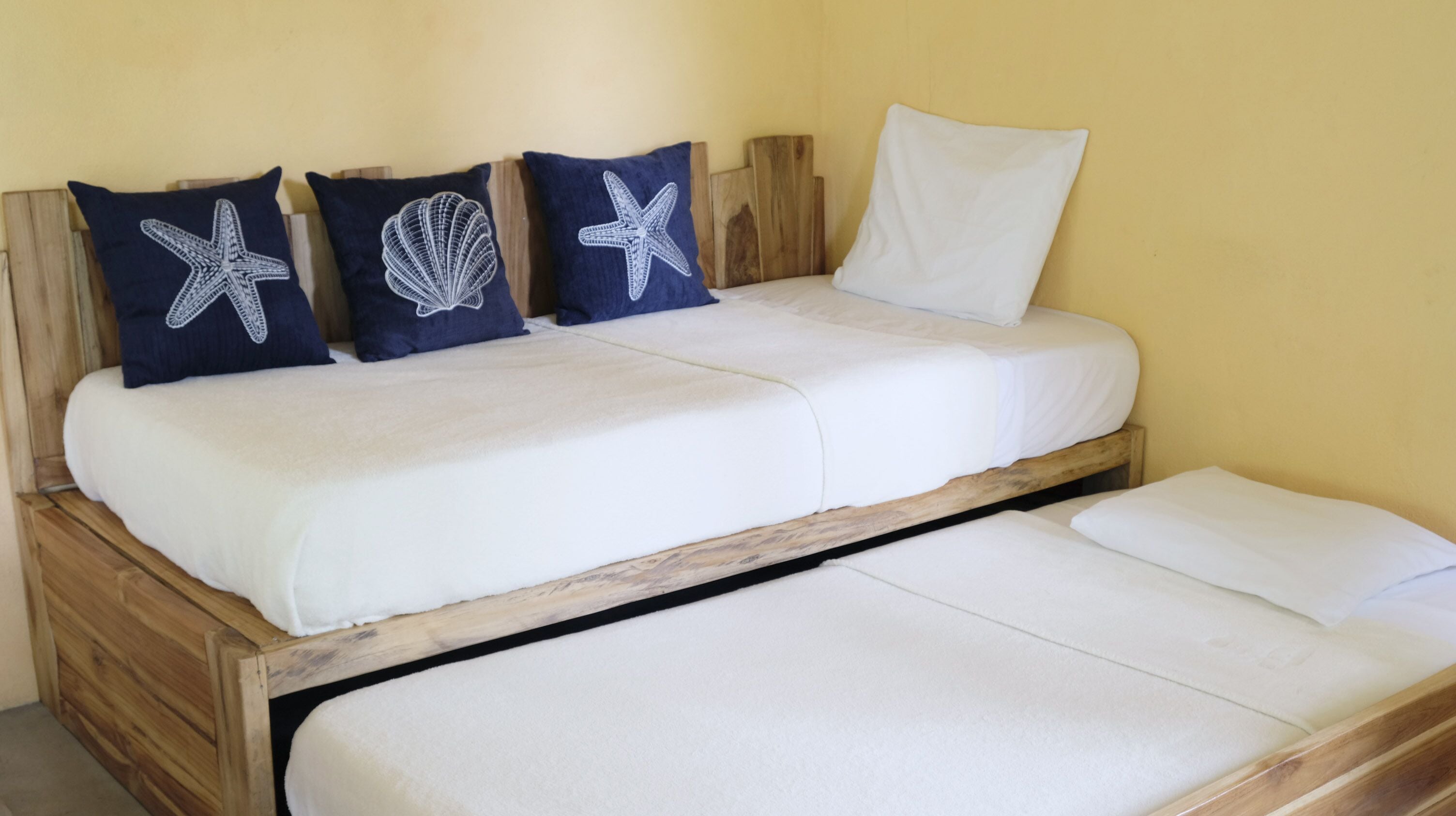 deluxe studio suite, multiple beds, partial ocean view | premium bedding, minibar, in-room safe, individually decorated