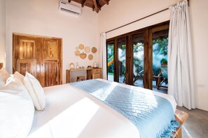 Quarto luxo | Vista para o jardim