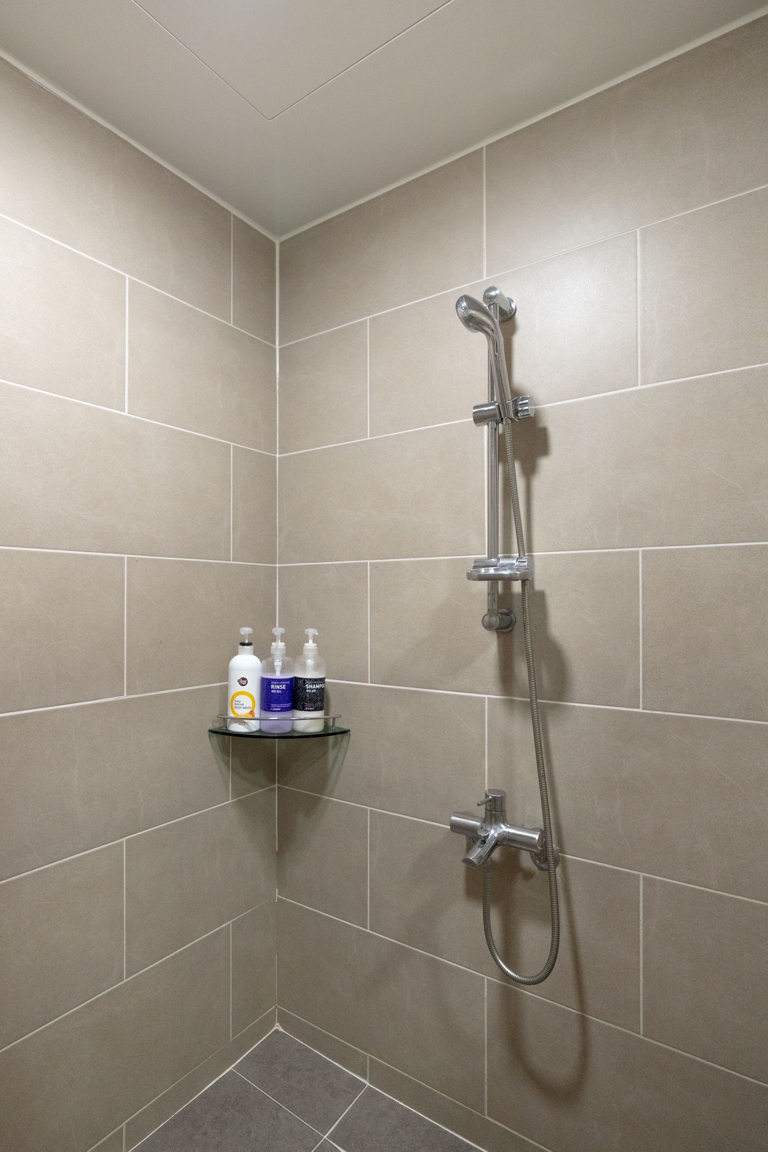 deluxe room | bathroom | shower, free toiletries, hair dryer, heated floors