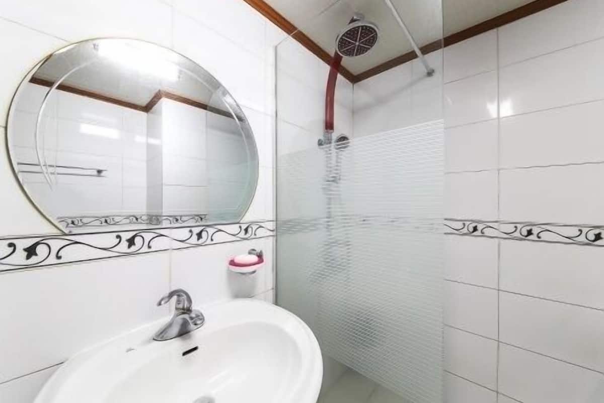 semi-deluxe room  | bathroom | shower, hair dryer, bathrobes, slippers