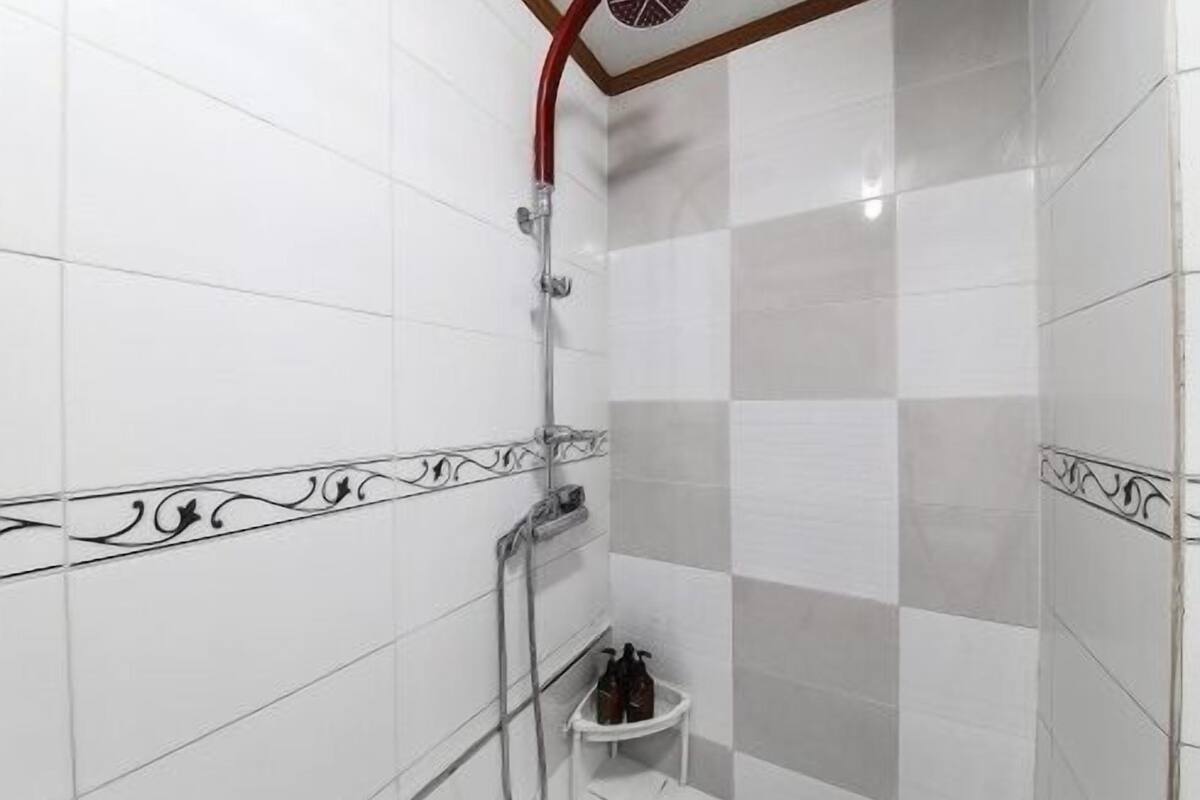 standard room | bathroom | shower, hair dryer, bathrobes, slippers